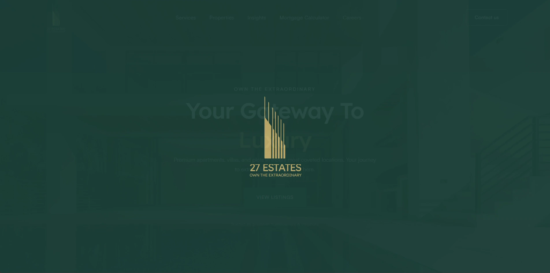 The 27 Estates website displayed on the monitor