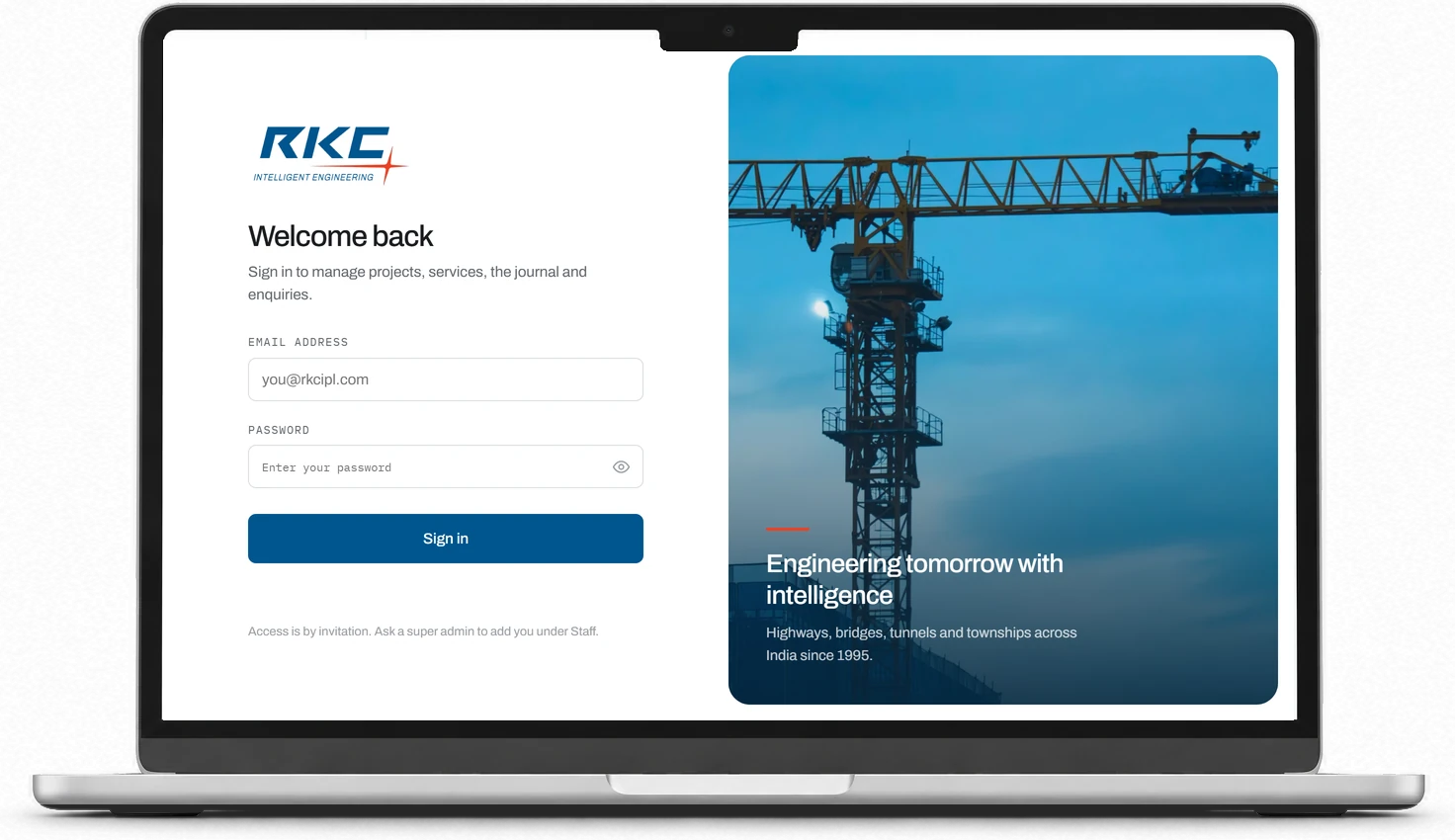 The RKC admin sign-in on a laptop, with the crane photograph